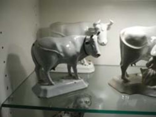 SERIES OF 5 COWS, GLAZED IN WHITE,