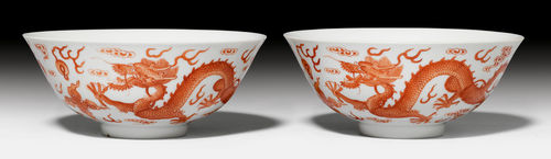 A PAIR OF IRON RED-PAINTED DRAGON BOWLS WITH IRON RED DAOGUANG MARKS.