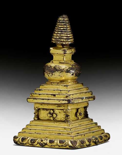 A GILT COPPER ALLOY STUPA.