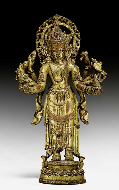 A GILT COPPER ALLOY FIGURE OF LAKSHMI-NARAYANA.