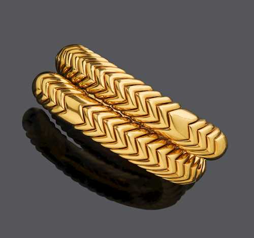 GOLD BANGLE, BY BULGARI.