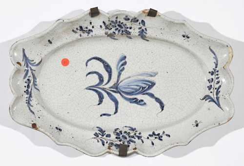 AN OVAL FAIENCE PLATE