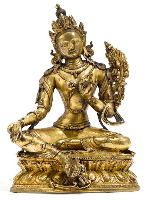 A GILT BRONZE FIGURE OF THE GREEN TARA.