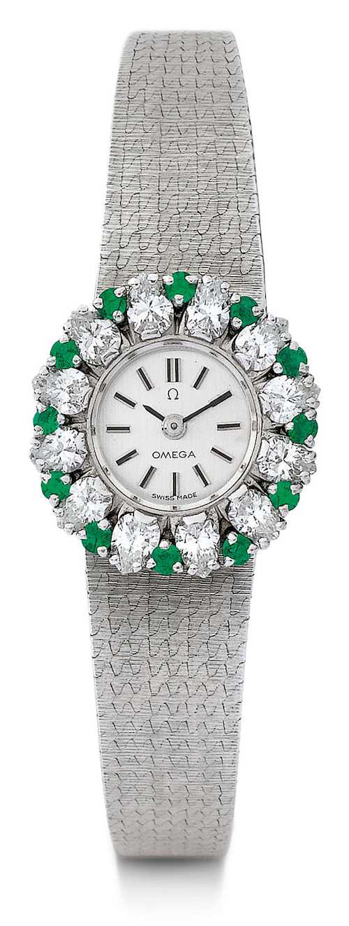 Omega, attraktive Diamant-Smaragd Damenuhr.