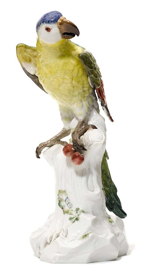 A MODEL OF A PARROT WITH CHERRIES