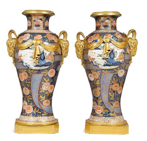 A PAIR OF VASES IN GILT BRONZE MOUNTS