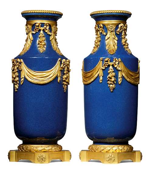 A PAIR OF ORNAMENTAL VASES WITH GILT BRONZE MOUNTS