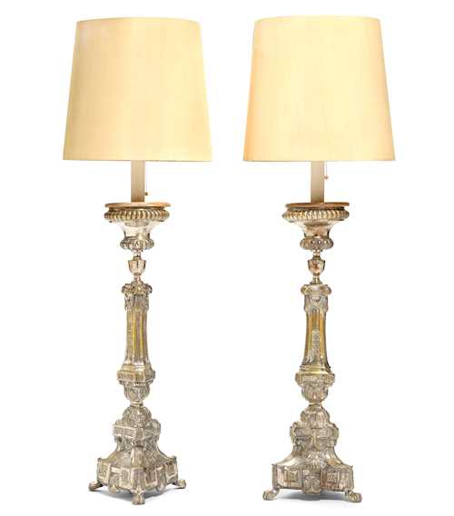 A PAIR OF ALTAR CANDLESTICKS MOUNTED AS FLOOR LAMPS