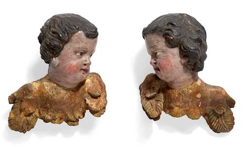 A PAIR OF WINGED ANGEL HEADS