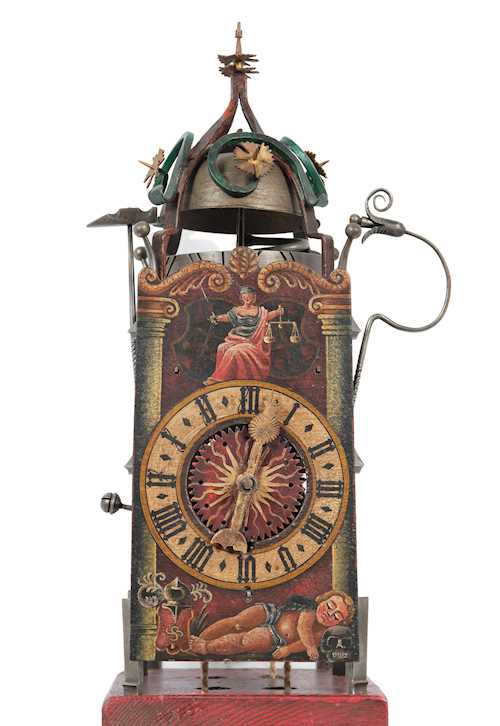 IRON CLOCK WITH WHEEL BALANCE