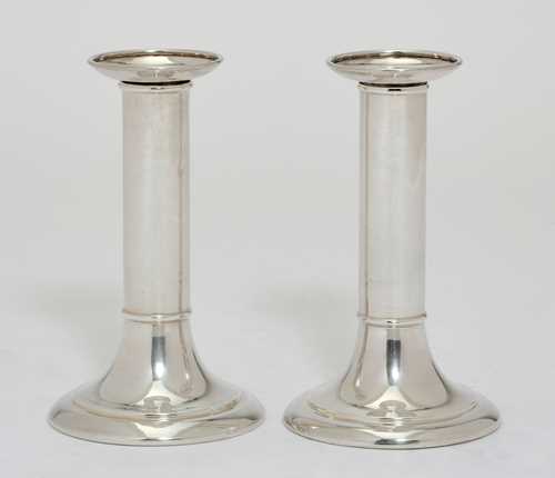 A PAIR OF CANDLESTICKS