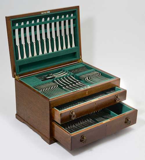 EXTENSIVE CUTLERY SET FOR 12 PERSONS, IN A WOODEN CABINET