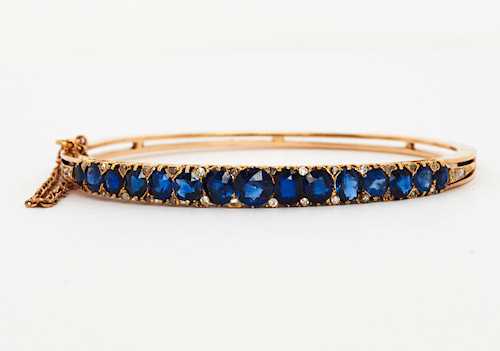 SAPPHIRE AND DIAMOND BANGLE, ca. 1900.