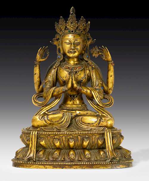 A GILT BRONZE FIGURE OF SHADAKSHARI.