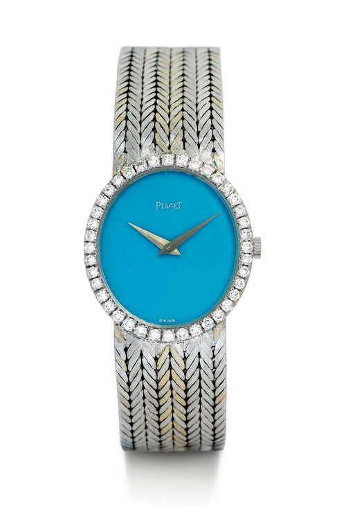 Piaget, fine and elegant lady's wristwatch with diamonds and turquoise dial.