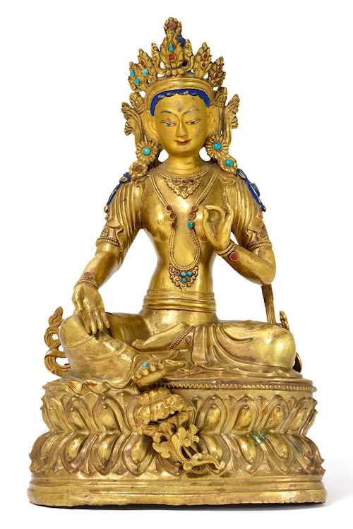 A GILT COPPER REPOUSSE FIGURE OF THE GREEN TARA.