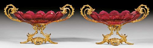 PAIR OF GLASS BOWLS WITH BRONZE MOUNTS,Louis XV style, probably Russia circa 1900. Red cut glass and gilt bronze. L 45 cm, H 25 cm.