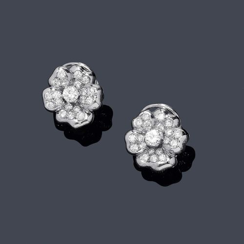 DIAMOND EAR CLIPS. White gold 750. Decorative ear clips designed as a stylized flower, set throughout with 40 brilliant-cut diamonds weighing ca. 2.00 ct.