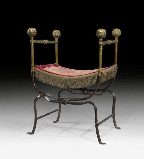 FOLDING CHAIR "EN CURULE",known as a "Faldistorium", Renaissance, Florence, 16th century. Wrought iron, bronze and brass. Wine-red velour seat. 65x50x55 cm. Provenance: - Former Quadrone collection, Turin. - From a French collection.