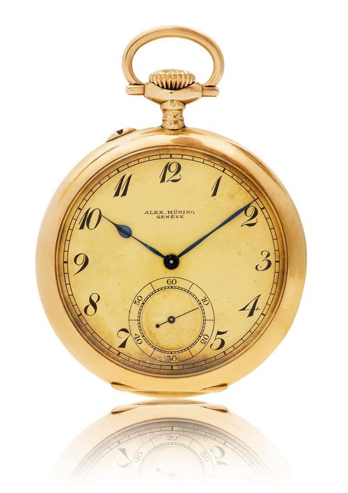 ALEX HÜNING LEPINE POCKET WATCH, ca. 1910. Yellow gold 585. Polished case No. 48724 with engine-turned back and blank monogram cartouche. Pusher for setting hands at 11h, metal dust cover with dedication. Matte-gilt dial with black, Arabic numerals and blued hands, recessed small second at 6h, dial signed: Alex Hüning Genève. Fine, precision bridge lever movement with compensation balance, Breguet spring, and swan neck regulator. D 50 mm.