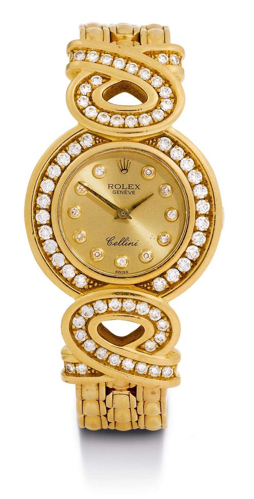 ROLEX CELLINI DIAMOND WRISTWATCH, 1997. Yellow gold 750. Ref. 5218-8, round case, No. W042844 set throughout with 24 diamonds. Bow-shaped lugs, each set with 20 diamonds. Gold-coloured dial with 11 diamond indices, signed: Rolex Genève Cellini, gold hands. Round hand-winding movement Cal. 1400 with 18 rubies. Gold link band with box clasp. Total length: 15.5 cm. Case dimensions: 25 mm. With original case and warranty certificate.