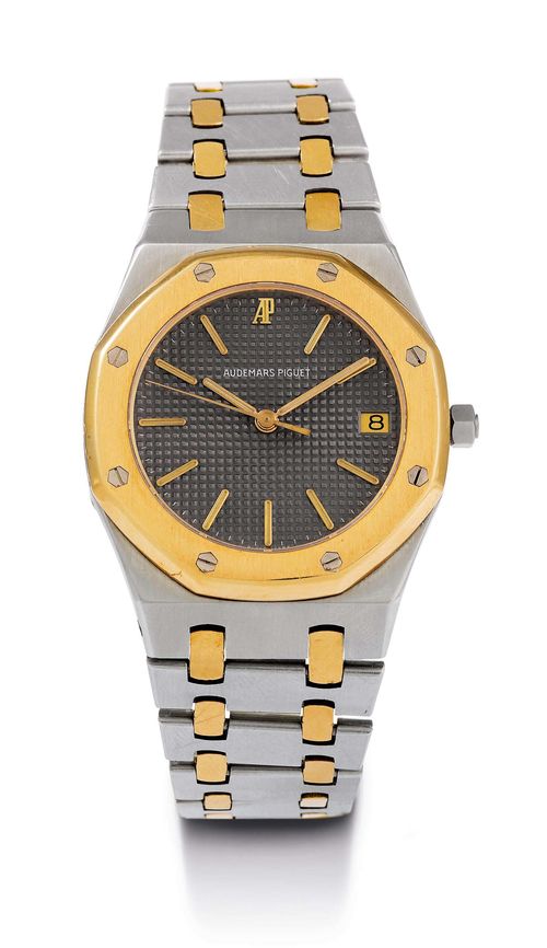 GENTLEMAN'S WRISTWATCH, AUDEMARS PIGUET, ROYAL OAK, 1980s. Steel and yellow gold 750. Ref. B 96557. Matte-finished steel case No. 812 with octagonal gold lunette. Anthracite-coloured, engine-turned dial with luminous indices and luminous hands, central second hand, and date at 3h. Quartz movement No. 261012. Bicolour band is stretched, with fold-over clasp. D 35 mm.