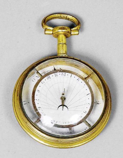 A COMPASS SUNDIAL, France, circa 1780. Sign. ROUSSEAU JNV. FEC. Gilt metal in the shape of a pocket watch and painted with flowers, D 4 cm.