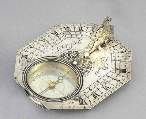 A HORIZONTAL SUNDIAL IN CASE, Paris, circa 1700. Silver sign. BUTTERFIELD PARIS. Bird-shaped pointer. In with black leather covered wooden case, 7x6x1.7 cm.
