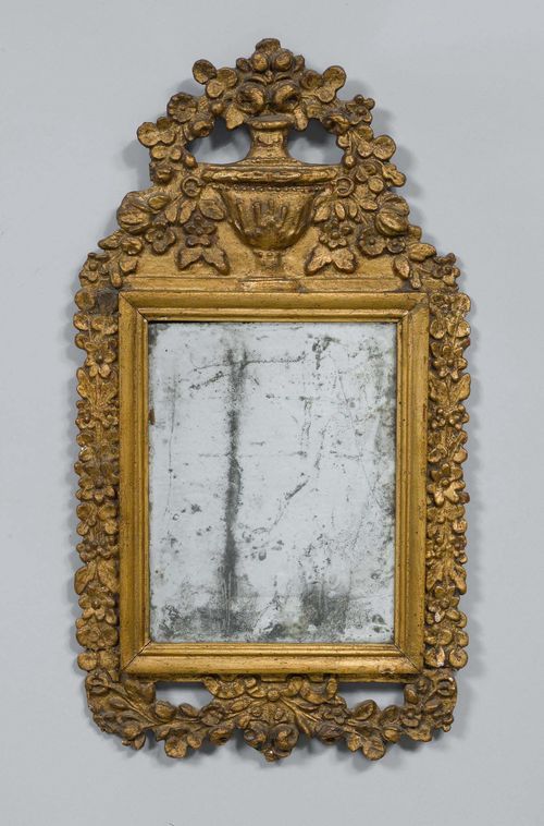 MIRROR,in the style of Louis XVI, Italy. Wood, open-worked and carved, gilt and patinated. Rectangular frame. H 60 cm.