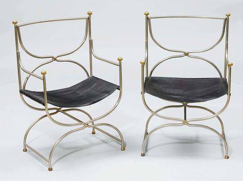 PAIR OF SCISSOR CHAIRS, according to the Empire style, 20th century. Iron and bronze. Leather seating surface on a curved frame with an open-worked backrest and straight armrests.