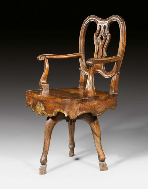 BUREAU-FAUTEUIL,Louis XV, Venice circa 1760. Carved walnut. Swiveling seat. Yellow velour seat cushion. 50x42x48x89 cm. A rare armchair in original condition.