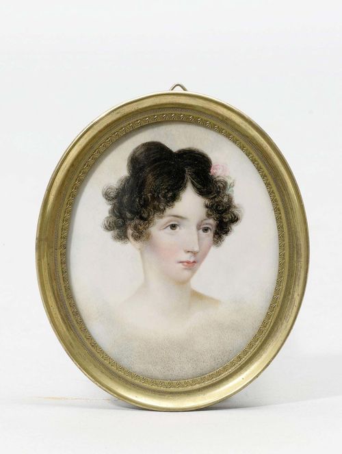 FRENCH SCHOOL, early 19th century. Mixed media on ivory. Oval portrait of a young woman with curly black hair. 8x6.4 cm.