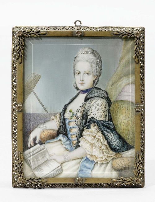 PORTRAIT OF A LADY, ca. 1870. Mixed media on ivory. Rectangular. Seated lady with pearl jewellery, holding a book in her left hand. 9.7x7.7 cm.