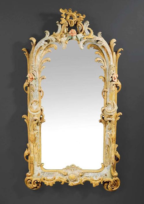 PAINTED MIRROR,Louis XV-style, German circa 1900. Pierced, carved and polychrome painted wood. H 120 cm, W 63 cm. Provenance: Private collection, Brissago.