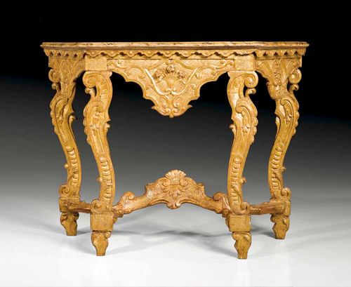 CARVED GILTWOOD CONSOLE, Baroque, Northern Italy circa 1750. The top "en faux marbre".106x41x83 cm. Provenance: Private collection, Lugano.