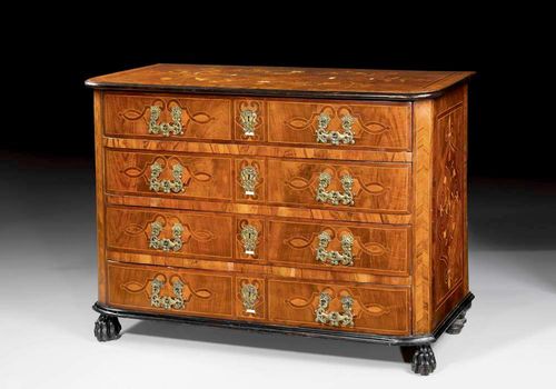 CHEST OF DRAWERS,Early Baroque, probably Piedmont circa 1700/20. Walnut and local fruitwoods in veneer, finely inlaid with ivory and partly ebonised. With 4 drawers and fine bronze mounts and drop handles. 136x70x89 cm. A fine chest of drawers in good condition