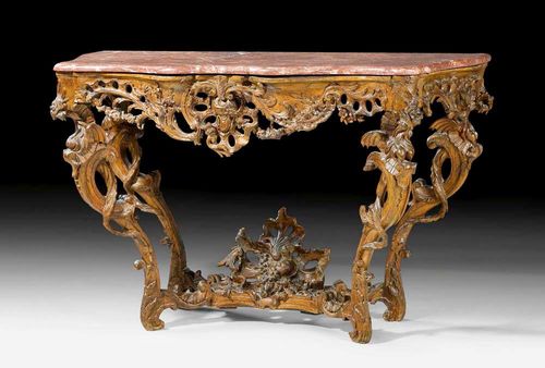 CONSOLE "AUX DRAGONS",Louis XV, from a Paris master workshop, probably  by N. PINEAU (Nicolas Pineau, 1684-1754), circa 1745. Pierced and richly carved oak with dragons, cartouches, flowers and leaves. With a later red/grey speckled marble top. 125x68x84 cm. Provenance: Swiss private collection.