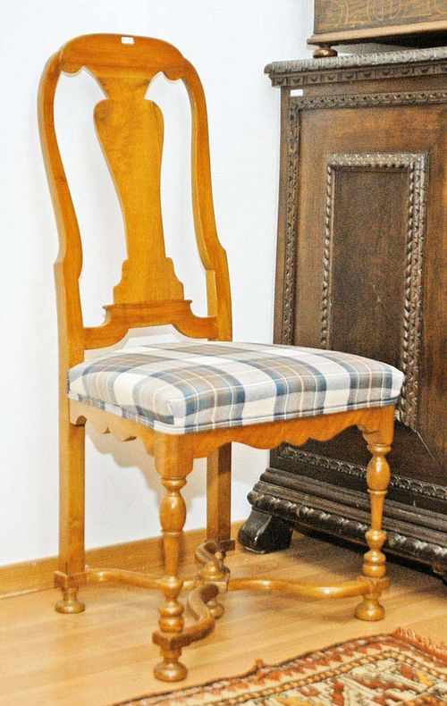 SET OF 6 WALNUT CHAIRS,late Baroque, probably Zurich, 19th century. Polychrome fabric covers with geometric patterns. 60x58x48x104 cm.