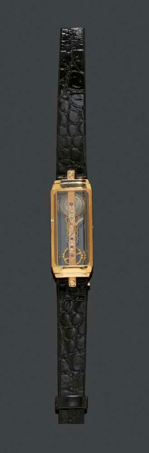 LADY S WRISTWATCH CORUM GOLDEN BRIDGE 1980s. Yellow gold 750