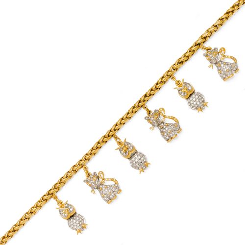 GOLD AND DIAMOND NECKLACE. Yellow gold 750, partly rhodium-plated, 46 g. Braided necklace, decorated with 6 diamond-set pendants, 3 designed as cats and 3 designed as owls. Total diamond weight ca. 1.50. L ca. 43 cm.