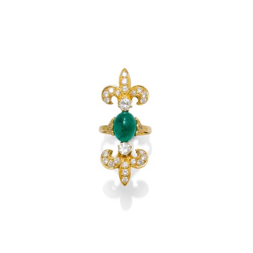EMERALD AND DIAMOND RING. Yellow gold 750. Decorated with 2 "Fleur-de-Lys" motifs, set with 1 emerald cabochon weighing ca. 3.00 ct and 24 diamonds weighing ca. 1.00 ct. Size ca. 52.