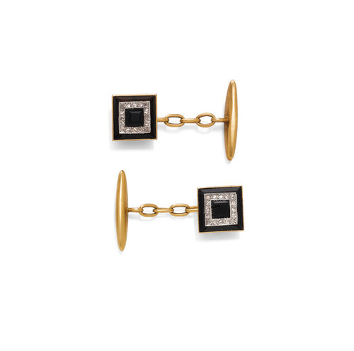 ONYX AND DIAMOND CUFF LINKS, ca. 1920.