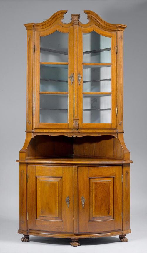 A CORNER VITRINE CABINET,