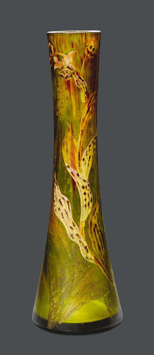 EMILE GALLE VASE, dated 1909 Green glass, etched and enamelled. Conical vessel, decorated with orchids. Signed Cristallerie d'Emile Gallé, 1909. H 39 cm.