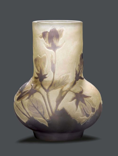 EMILE GALLE VASE, circa 1900 White glass with white and violet overlay and etching. Pear-shaped, decorated with flowers. Signed Gallé. Mouth chipped. H 10 cm.