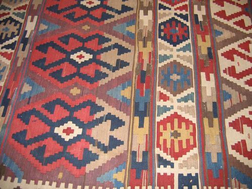 GASHGAI KILIM old. With horizontal stripes with large hooked octagons, narrow border. Slight wear.325x165 cm.