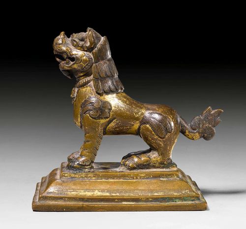 A FINE GILT COPPER LION. Nepal, ca. 16th c. Height 11 cm.