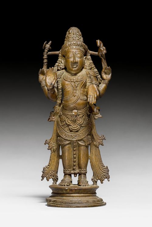 A BRONZE FIGUR OF THE STANDING SHIVA.