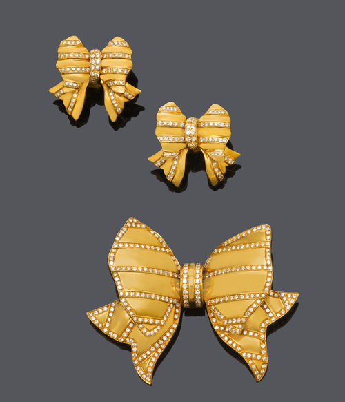 GOLD AND DIAMOND BOW BROOCH WITH EARCLIPS, BY REPOSSI.