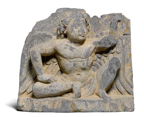 A FINE RELIEF OF A YOUTHFUL WINGED ATLAS.
